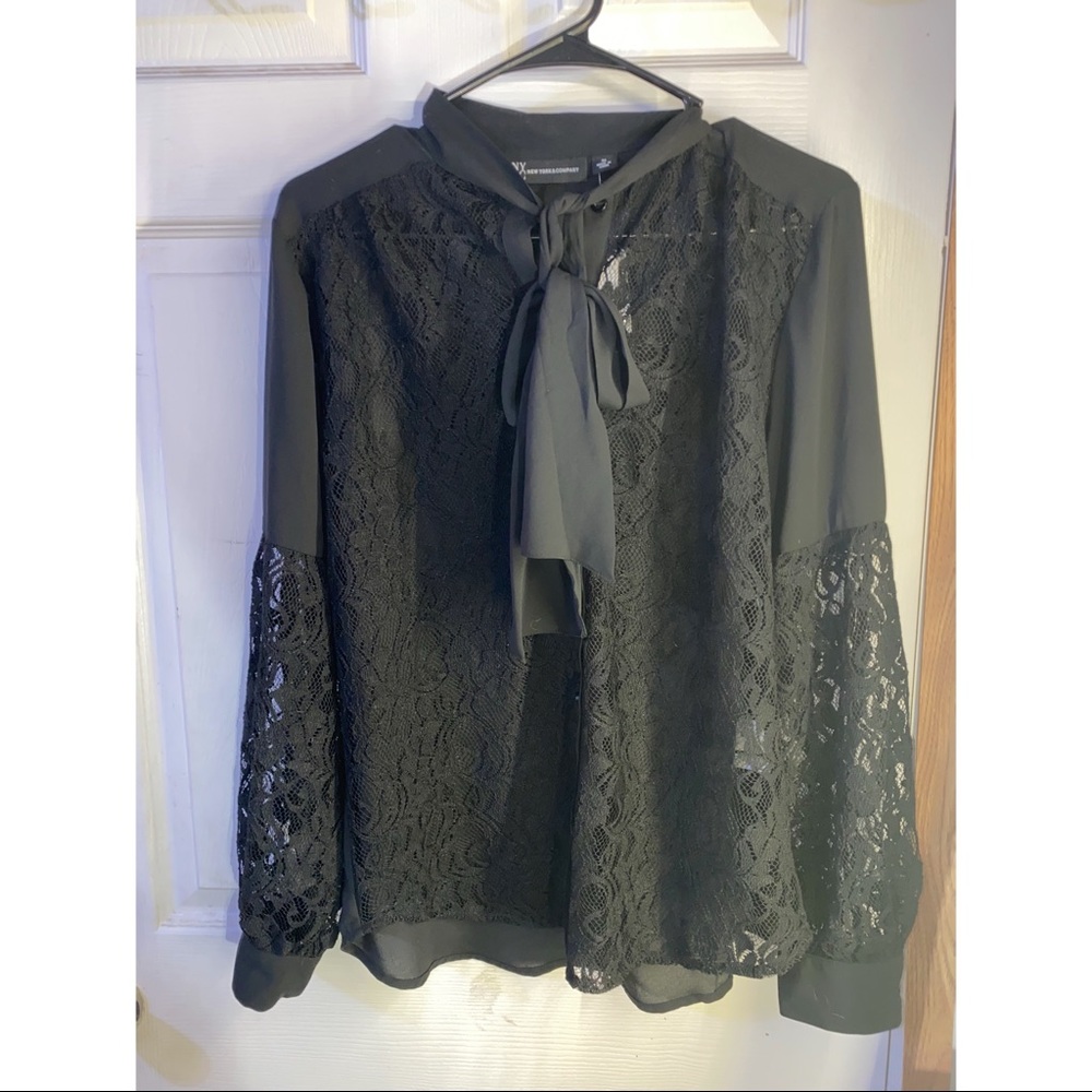 Black lace front blouse and sheer back